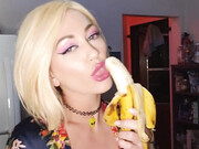 adiraallure-30-03-2020-28318000-eating a banana sensually in a wig